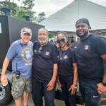 Co-Founder JC Reid with Ray's BBQ Shack team: Ray Busch, Maxine Davis, Herb Taylor