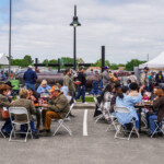 Guests enjoying the barbecue