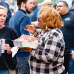 Guests enjoying the barbecue